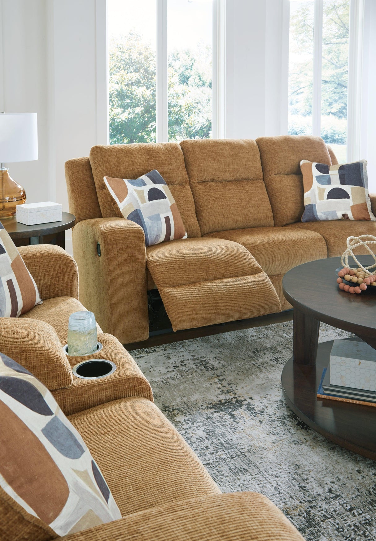 Kanlow Honey Manual Reclining Sofa and Loveseat by Ashley at Eve Furniture