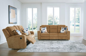 Kanlow Honey Manual Reclining Sofa and Loveseat by Ashley at Eve Furniture