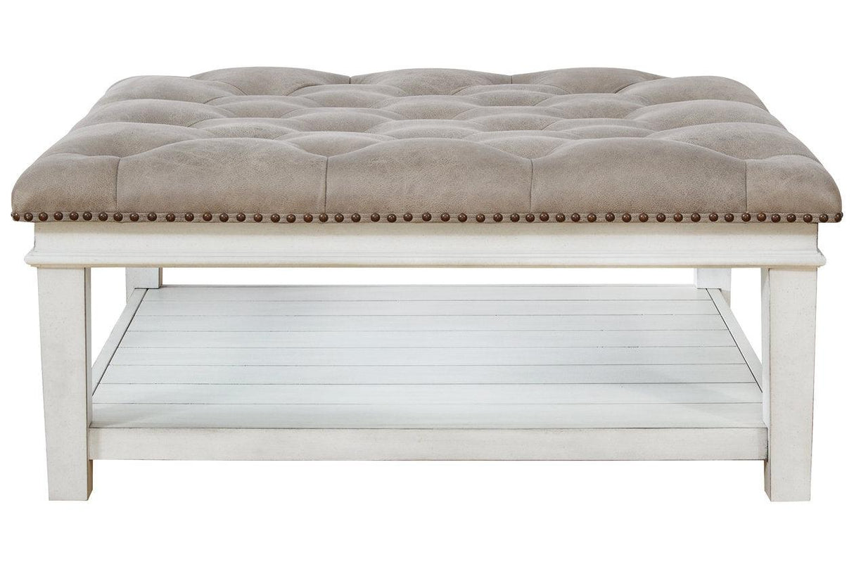 Kanwyn Whitewash Upholstered Ottoman Coffee Table by Ashley at Eve Furniture