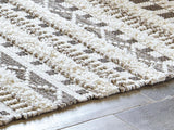 Karalee Ivory/Brown 5' x 7' Rug by Ashley at Eve Furniture