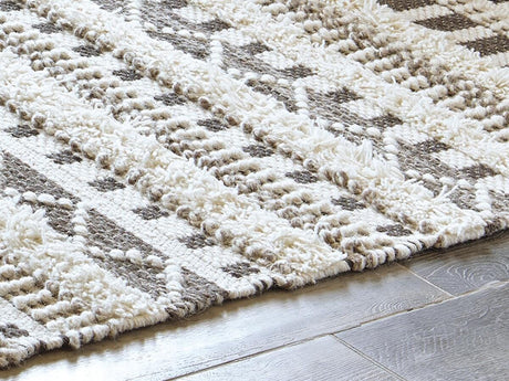 Karalee Ivory/Brown 5' x 7' Rug by Ashley at Eve Furniture