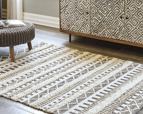 Karalee Ivory/Brown 8' x 10' Rug by Ashley at Eve Furniture