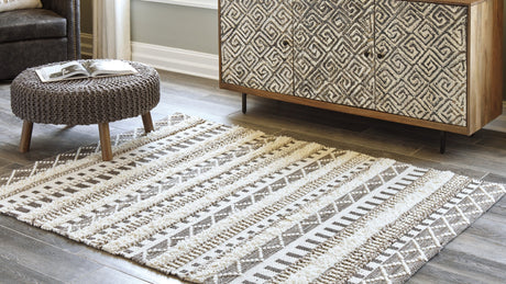Karalee Ivory/Brown 8' x 10' Rug by Ashley at Eve Furniture