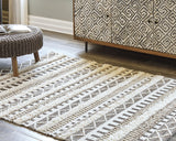 Karalee Ivory/Brown 8' x 10' Rug by ASHLEY FURNITURE at Eve Furniture