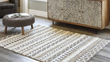 Karalee Ivory/Brown 8' x 10' Rug by ASHLEY FURNITURE at Eve Furniture