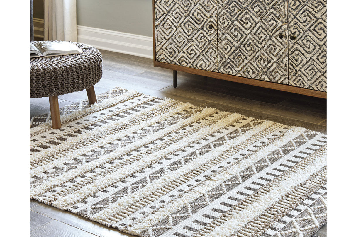Karalee Ivory/Brown 8' x 10' Rug by ASHLEY FURNITURE at Eve Furniture