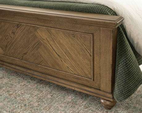 Karallin Medium Brown California King Panel Bed by Ashley at Eve Furniture