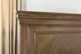 Karallin Medium Brown Panel Bedroom Set by Ashley at Eve Furniture