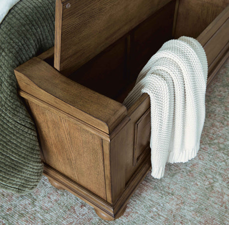 Karallin Medium Brown Queen Panel Storage Bed by Ashley at Eve Furniture