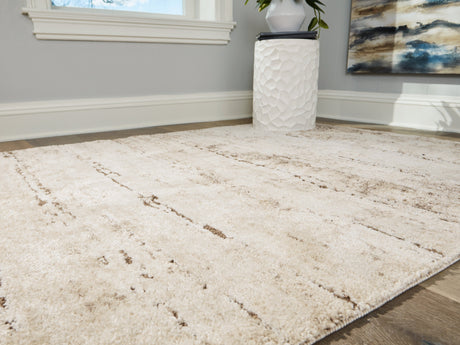 Kasney Cream/Brown Large Rug by Ashley at Eve Furniture