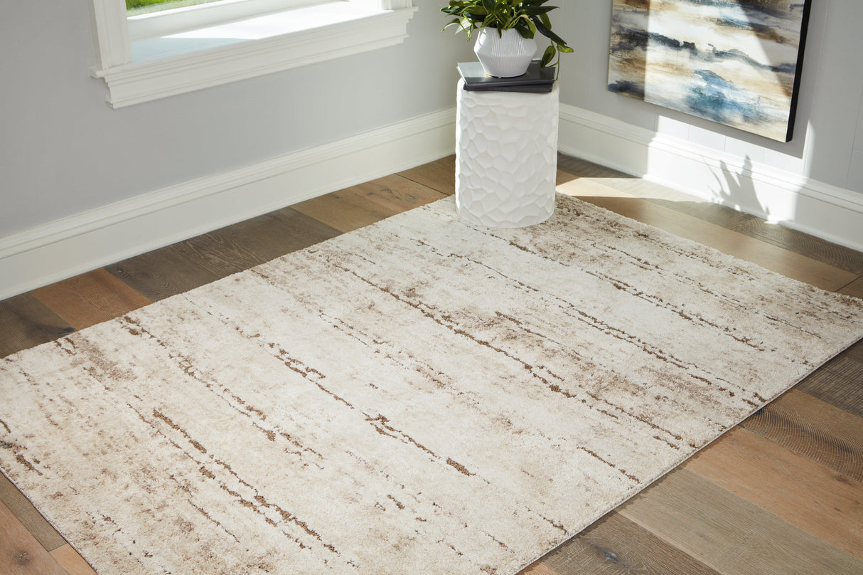 Kasney Cream/Brown Large Rug by Ashley at Eve Furniture