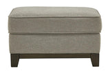 Kaywood Granite Ottoman by Ashley at Eve Furniture