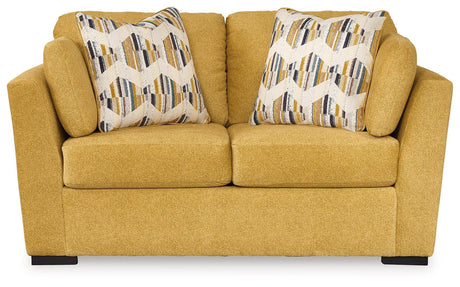 Keerwick Sunflower Loveseat by Ashley at Eve Furniture