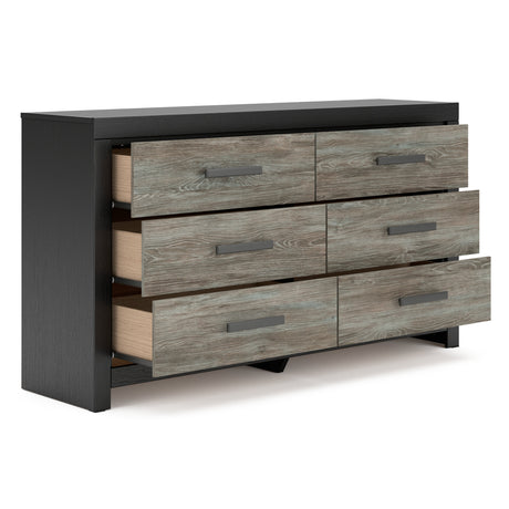 Kendanport Brown/White Upholstered Bedroom Set features elegant upholstered details, a stylish brown and white finish, and modern craftsmanship, perfect for creating a sophisticated bedroom retreat. by Ashley at Eve Furniture