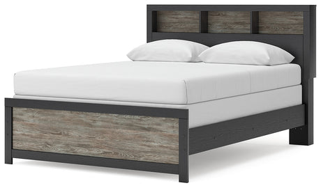 Kendanport Brown/White Upholstered Bedroom Set features elegant upholstered details, a stylish brown and white finish, and modern craftsmanship, perfect for creating a sophisticated bedroom retreat. by Ashley at Eve Furniture