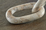 Kenport Light Beige Sculpture by Ashley at Eve Furniture