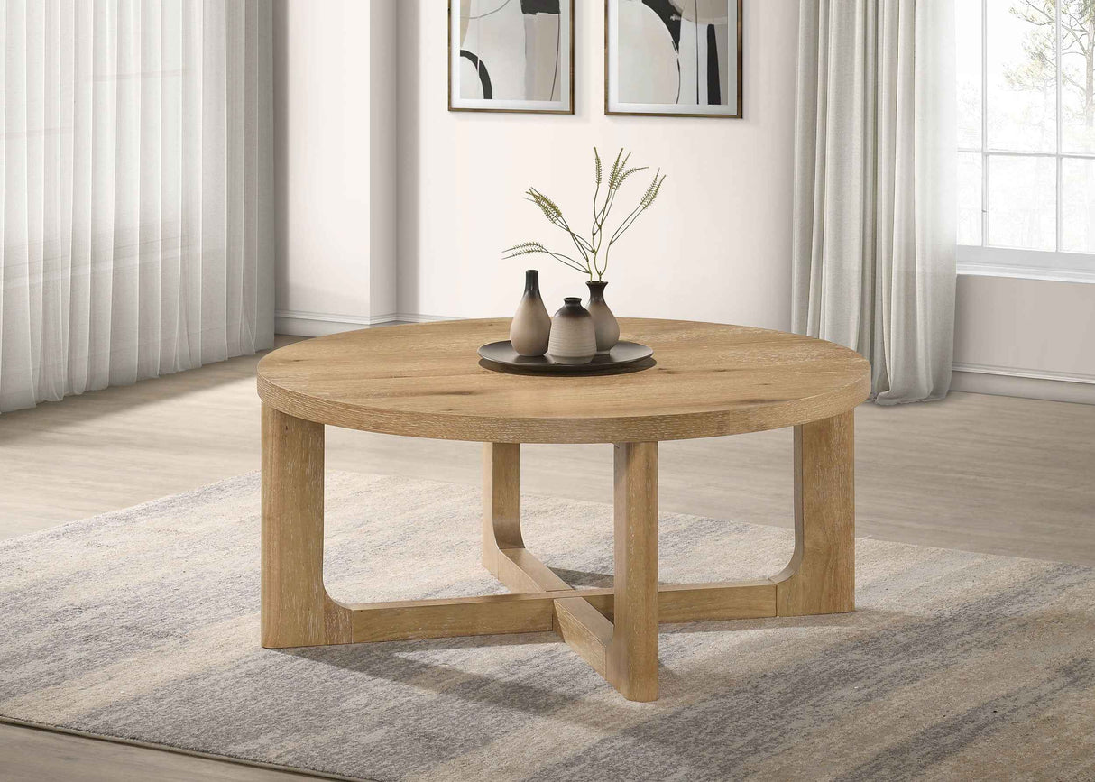 Kessler Light Oak Round Sculptural Wood Coffee Table by Coaster at Eve Furniture