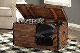 Kettleby Brown Storage Trunk by Ashley at Eve Furniture