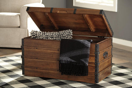 Kettleby Brown Storage Trunk by Ashley at Eve Furniture