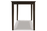 Kimonte Dark Brown Dining Table by Ashley at Eve Furniture