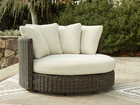Kimora Beige/Dark Brown Outdoor Swivel Lounge Chair with Cushion by Ashley at Eve Furniture