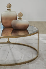 Korajane Antique Gold Coffee Table by Ashley at Eve Furniture