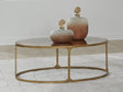 Korajane Antique Gold Coffee Table by Ashley at Eve Furniture