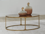 Korajane Antique Gold Coffee Table by Ashley at Eve Furniture