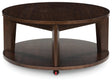 Korestone 2 Dark Brown Coffee Table by Ashley at Eve Furniture