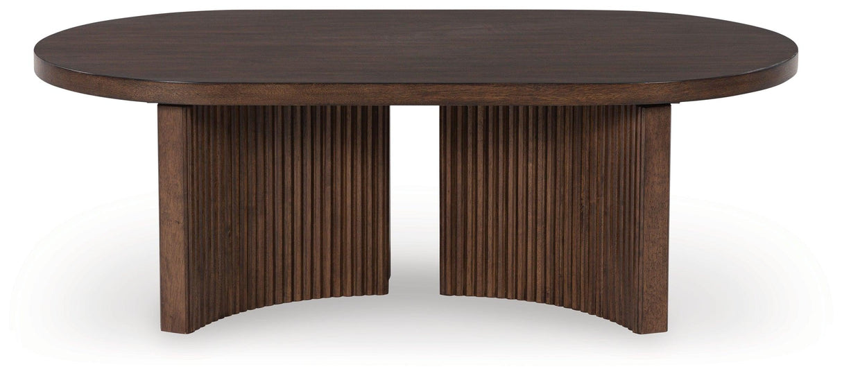 Korestone Dark Brown Coffee Table by Ashley at Eve Furniture