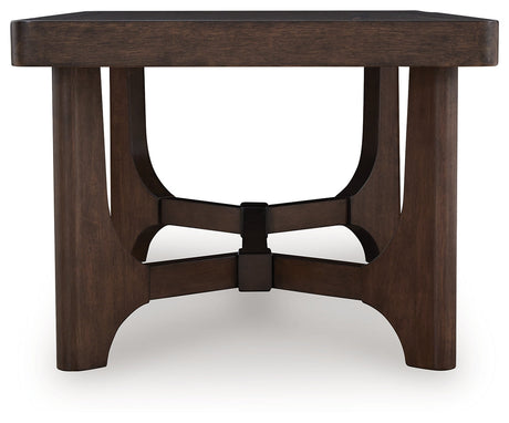 Korestone Dark Brown Coffee Table by Ashley at Eve Furniture
