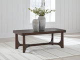 Korestone Dark Brown Coffee Table by Ashley at Eve Furniture