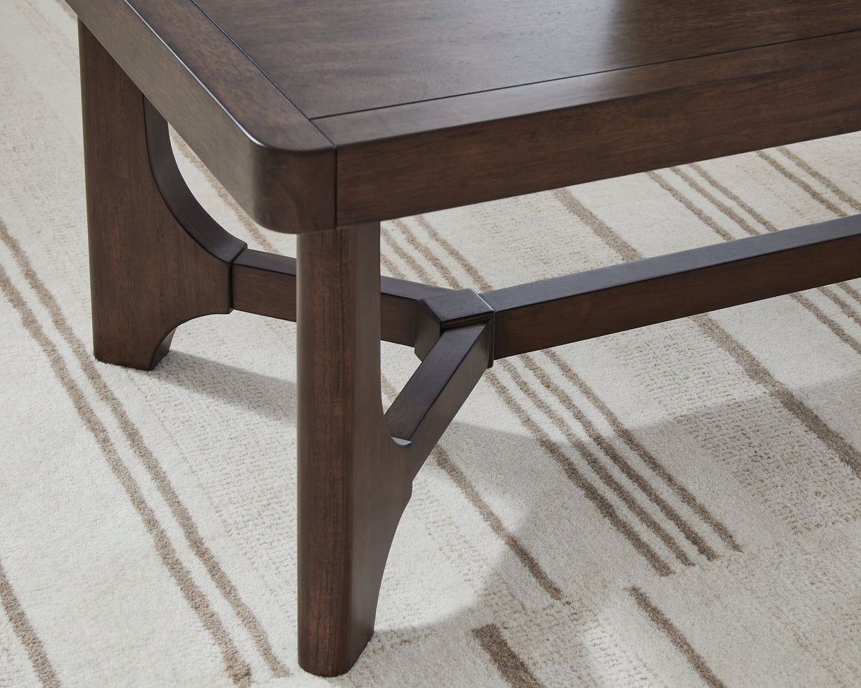 Korestone Dark Brown Coffee Table by ASHLEY FURNITURE at Eve Furniture