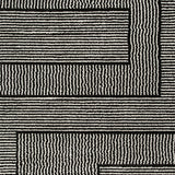 Kurtmen Black/Ivory Large Rug by Ashley at Eve Furniture