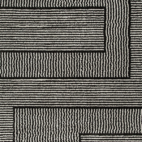 Kurtmen Black/Ivory Large Rug by Ashley at Eve Furniture