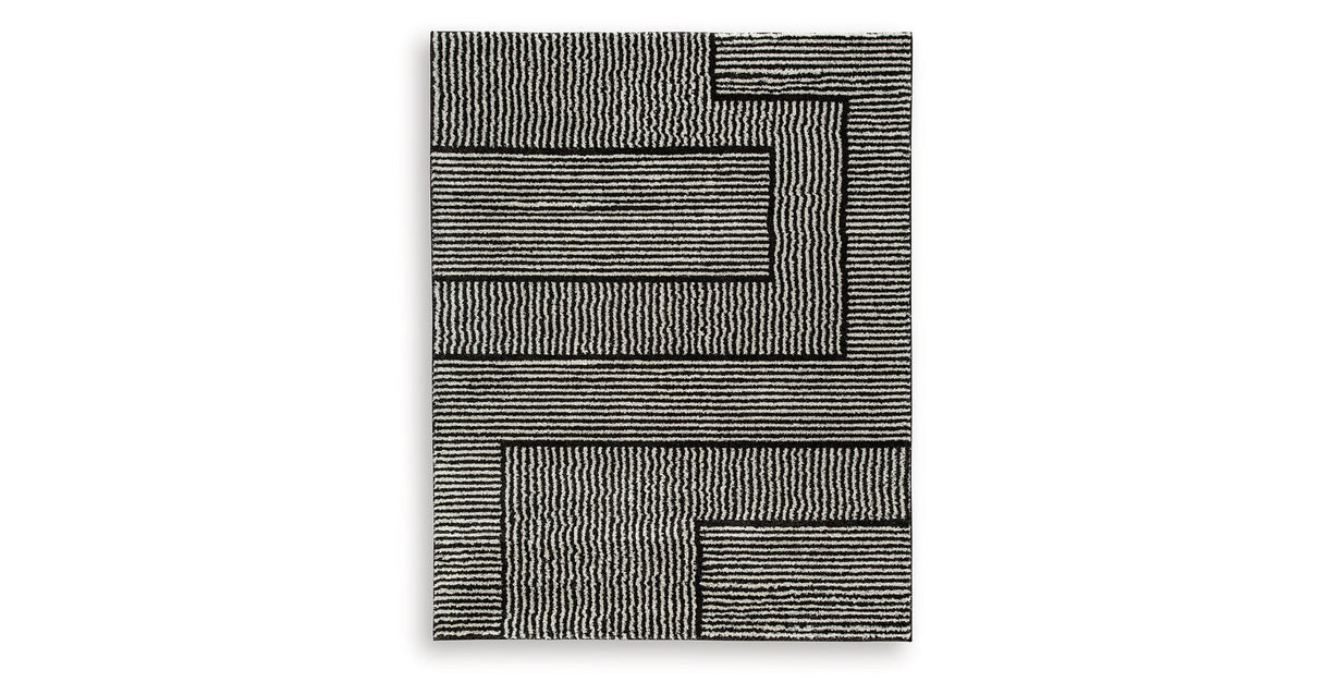 Kurtmen Black/Ivory Large Rug by Ashley at Eve Furniture