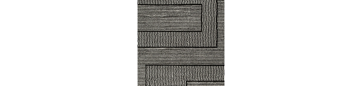 Kurtmen Black/Ivory Large Rug by Ashley at Eve Furniture