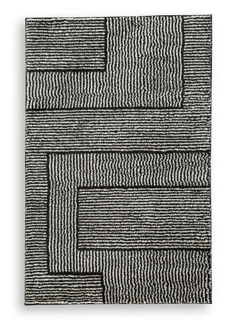 Kurtmen Black/Ivory Medium Rug by Ashley at Eve Furniture