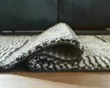 Kurtmen Black/Ivory Medium Rug by Ashley at Eve Furniture