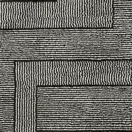 Kurtmen Black/Ivory Medium Rug by Ashley at Eve Furniture