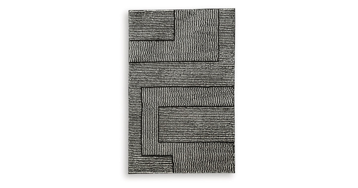 Kurtmen Black/Ivory Medium Rug by Ashley at Eve Furniture