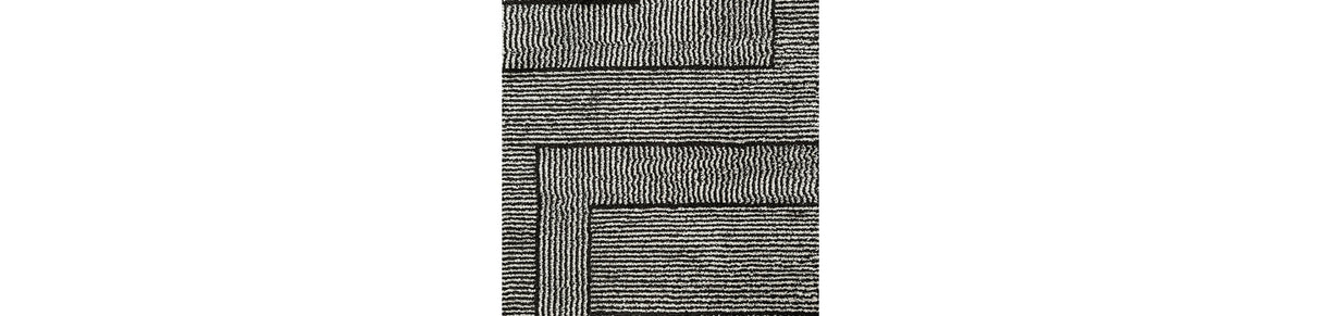 Kurtmen Black/Ivory Medium Rug by Ashley at Eve Furniture
