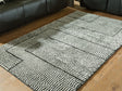 Kurtmen Black/Ivory Medium Rug by Ashley at Eve Furniture