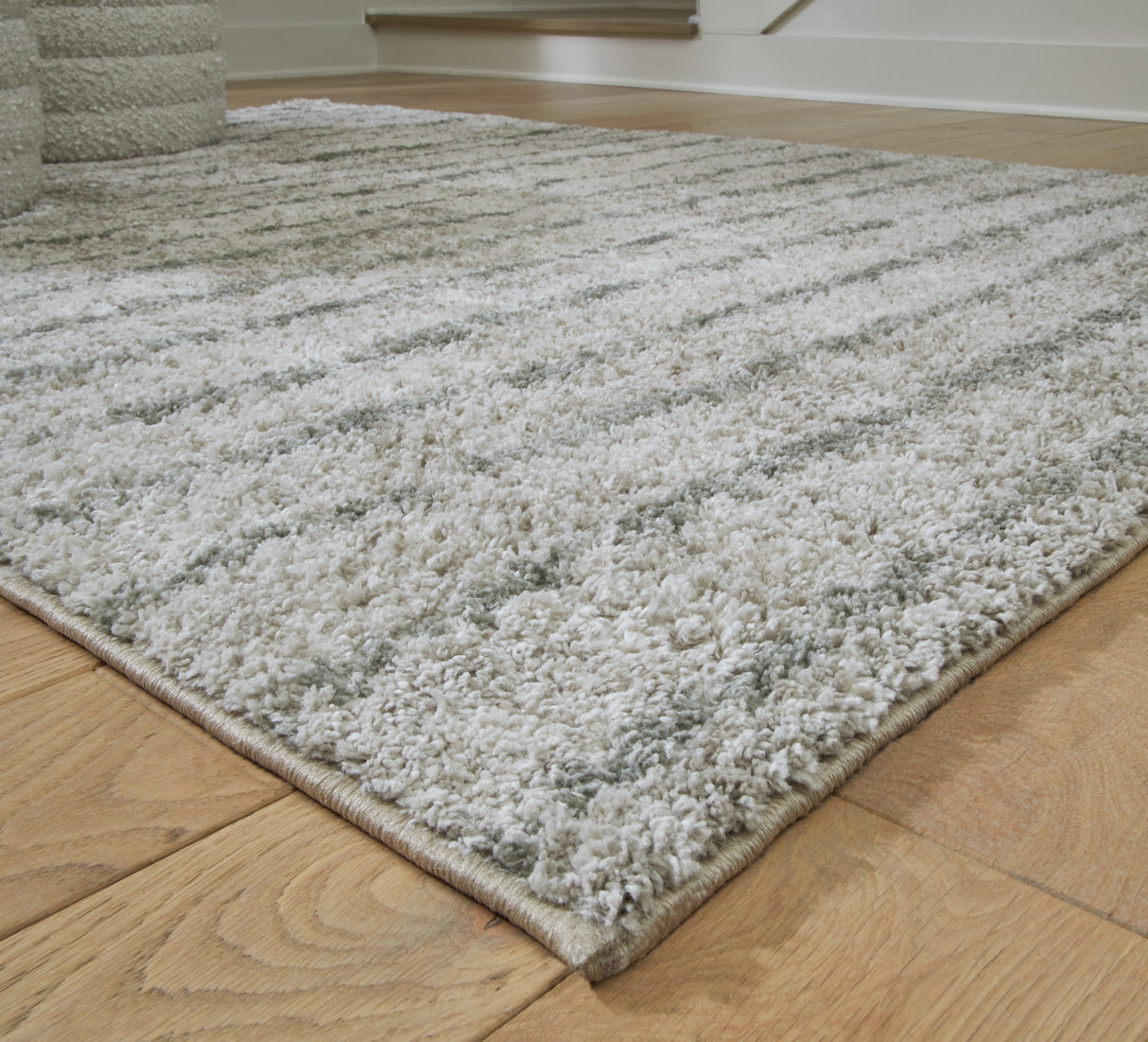 Laddway Cream/Green Medium Rug by Ashley at Eve Furniture