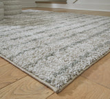 Laddway Cream/Green Medium Rug by Ashley at Eve Furniture