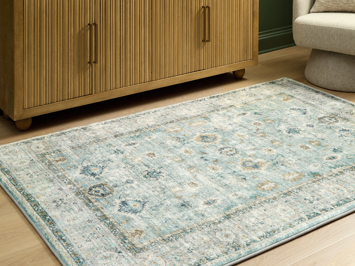 Ladstoney Teal/Beige/Ochre Medium Rug by Ashley at Eve Furniture