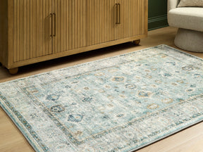 Ladstoney Teal/Beige/Ochre Medium Rug by Ashley at Eve Furniture