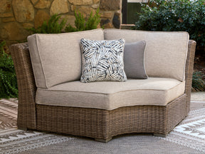 Laguna Heights Beige Outdoor Curved Corner Chair with Cushion by ASHLEY FURNITURE at Eve Furniture