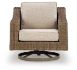 Laguna Heights Beige Swivel Lounge with Cushion by Ashley at Eve Furniture