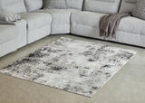 Langwell Black/Gray/White Medium Rug by Ashley at Eve Furniture